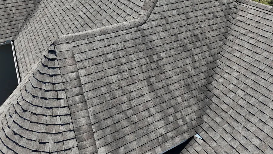 New architectural shingles along a hip and a valley